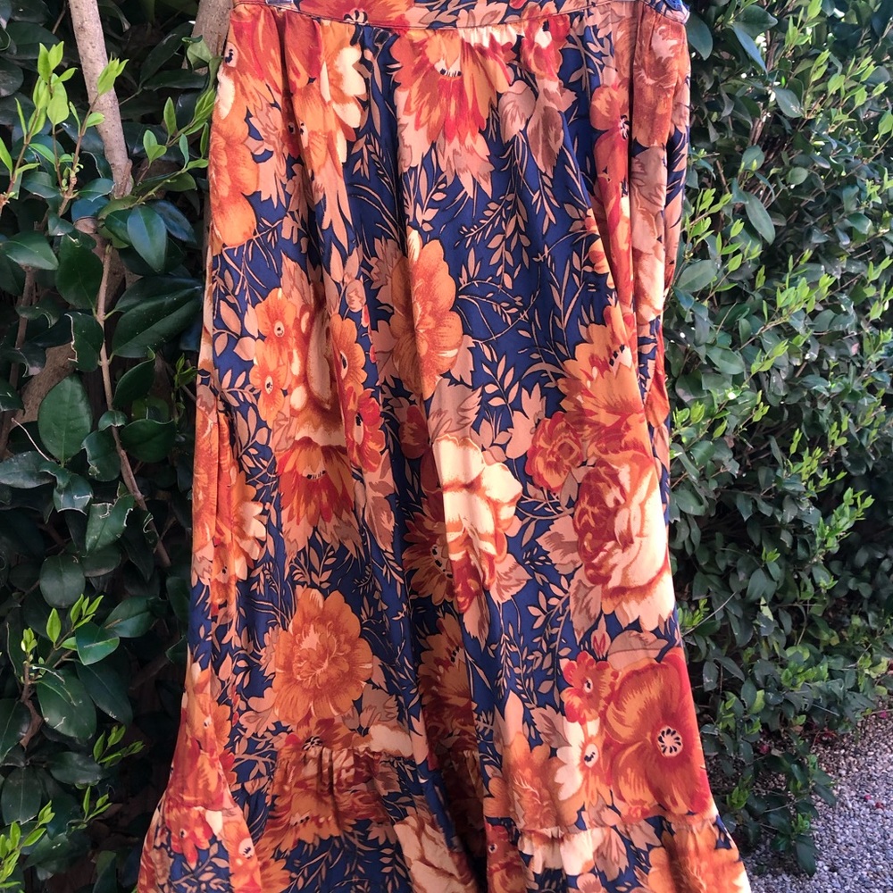 100% Silk Skirt, A Line but opens up beautifully.